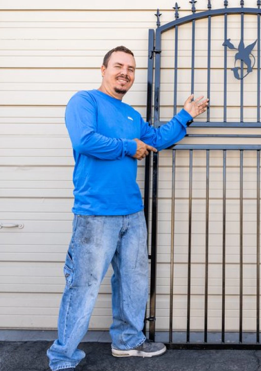 pointing at new finished fence metal phoenix az